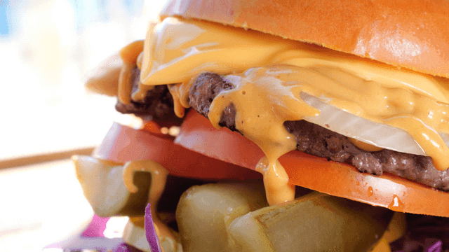 Juicy homemade burger with fresh vegetables