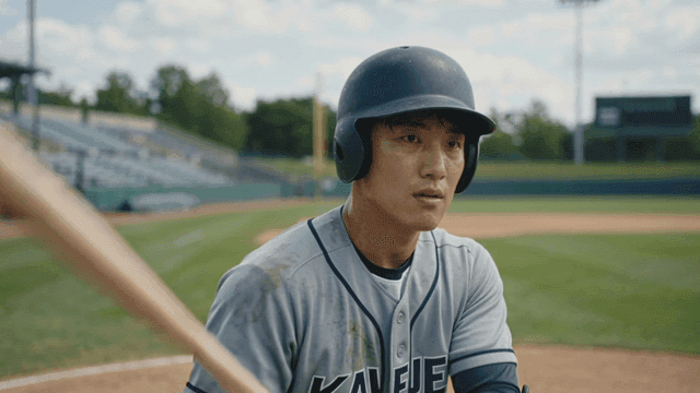 Baseball player preparing to step up to plate