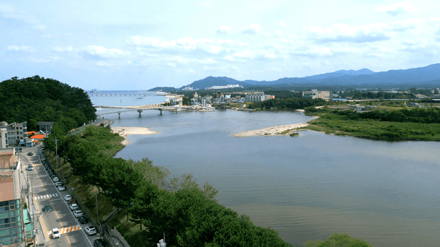 Scenic river flowing alongside road