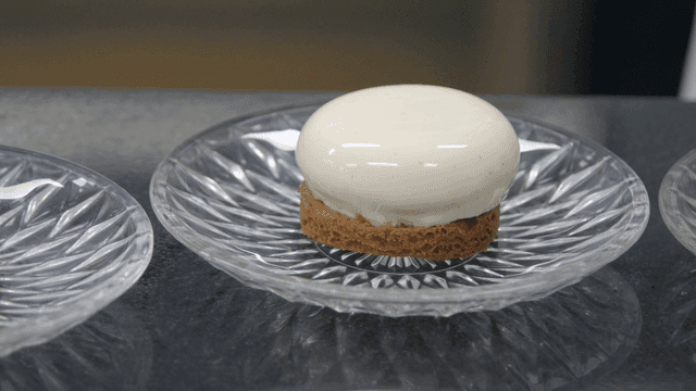 Glossy dessert on a glass plate