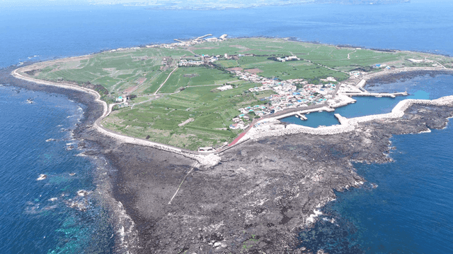 Beautiful island with lush vegetation and coastal villages