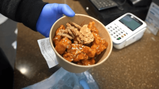 Crispy fried chicken in paper bowl