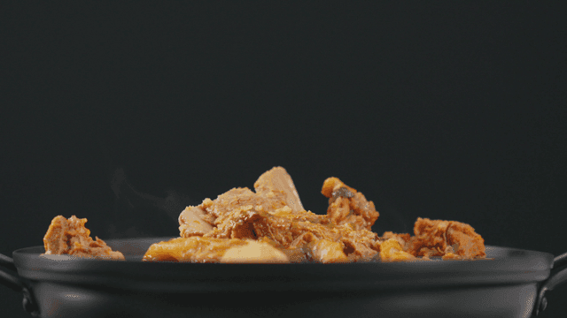 Pork backbone stew in steaming pot