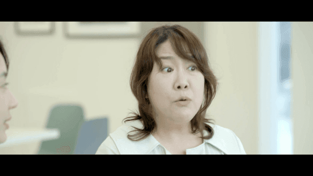 Two women having a conversation indoors