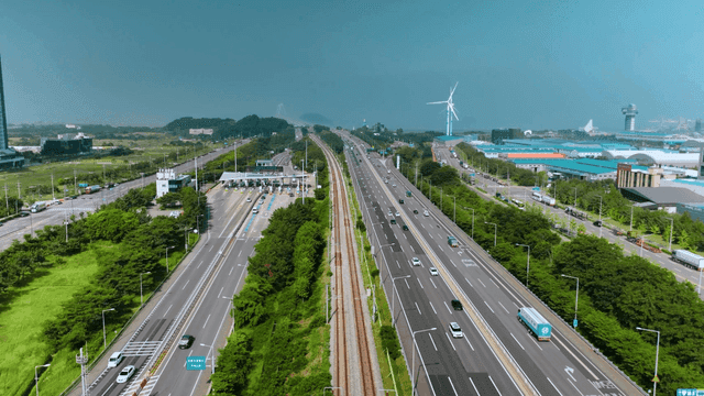 Highway and railway with cityscape