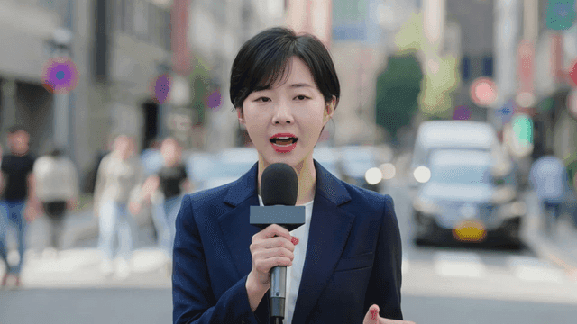 Reporter delivering news on a busy street