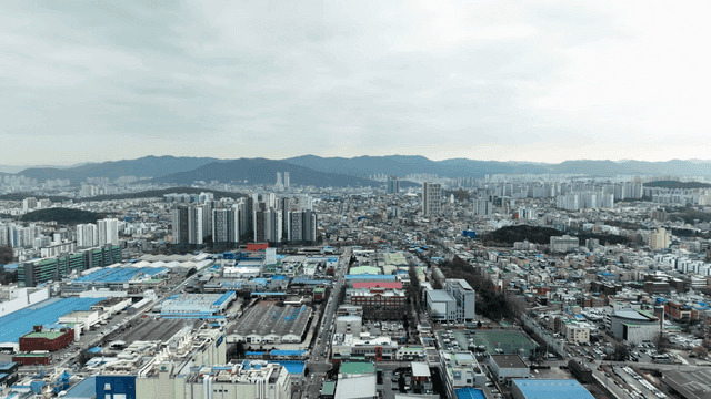 Panoramic view of industrial city with high-rise buildings