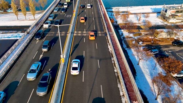 City Road with Cars in the Midday of Winter