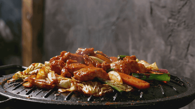 Spicy chicken galbi on grill
