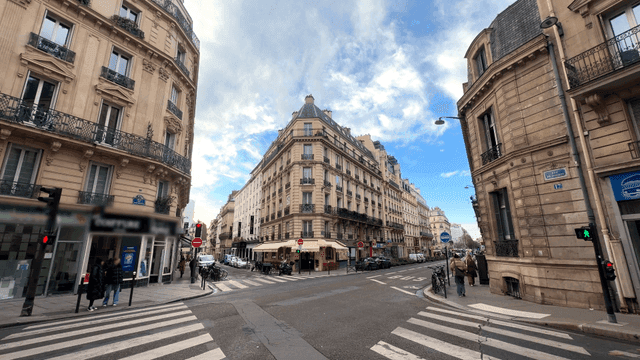 Bustling European city intersection with classical architecture