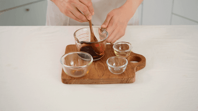 Mixing soy sauce in measuring cup