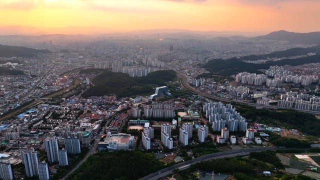 Sprawling cityscape at sunset