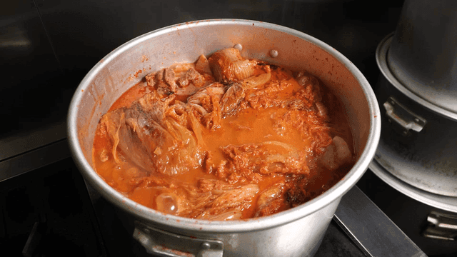 Kimchi stew boiling in pot
