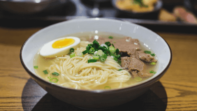 Bowl of ramen with egg and meat