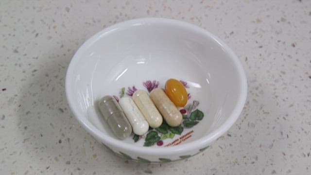 Vitamins and Supplements in a Bowl