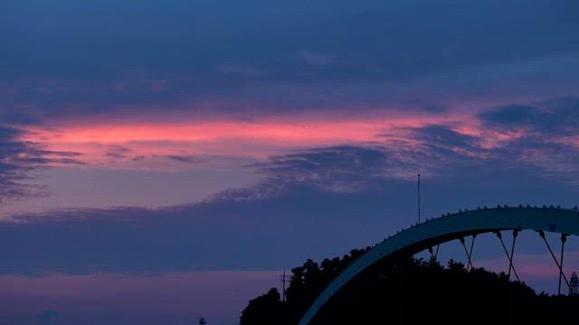 Twilight Sky Over an Urban Park Bridge