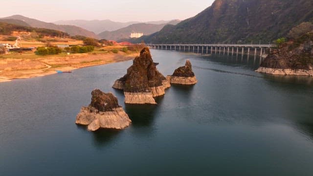 Rock islets in a serene river landscape