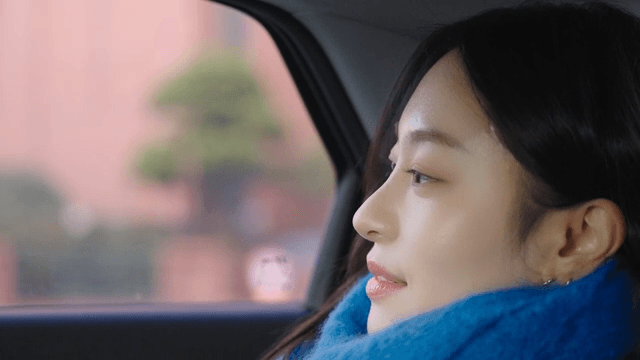 Woman looking out the taxi window