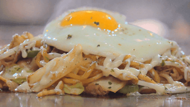 Japanese onto topped with a fried egg