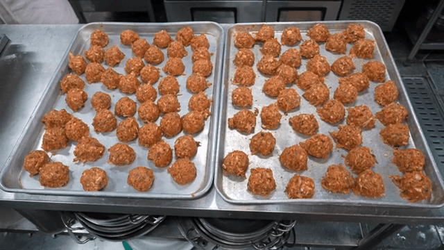 Dough balls prepared on a tray