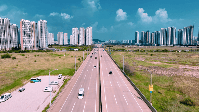 Highway with skyscrapers in the background