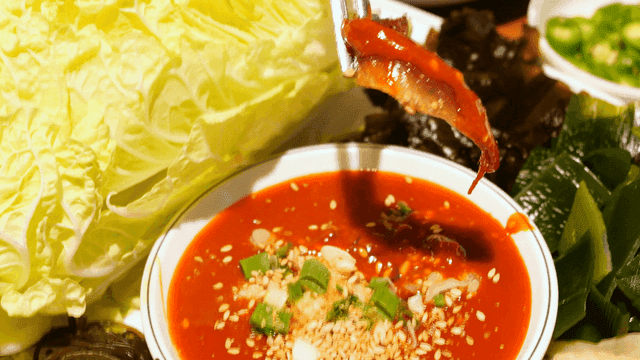 Dried seafood dipped in spicy chili sauce