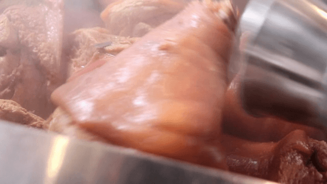 Pork hocks boiling in a pot