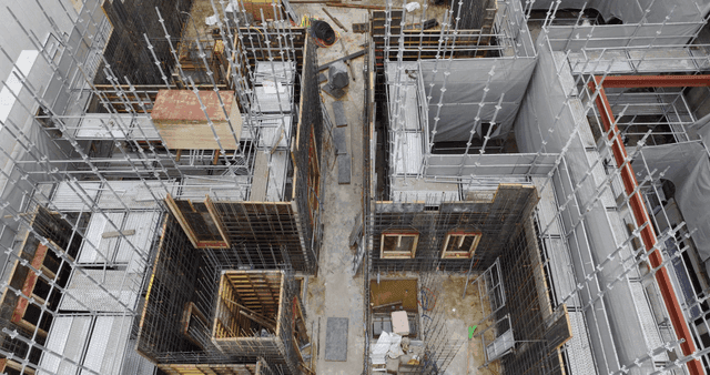 Construction site with scaffolding and materials