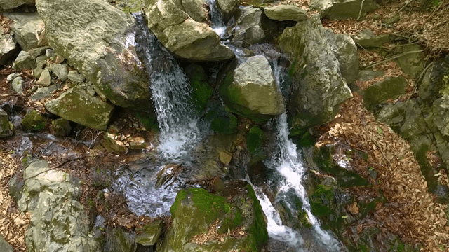 Small waterfall flowing over rocks