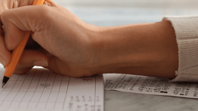 Calculating expenses with a calculator