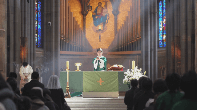 Priest conducting Mass at church
