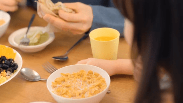 People enjoying breakfast together