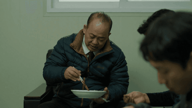 People enjoying Jajangmyeon indoors
