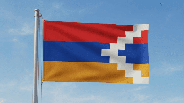 Flag of Republic of Artsakh fluttering against clear sky