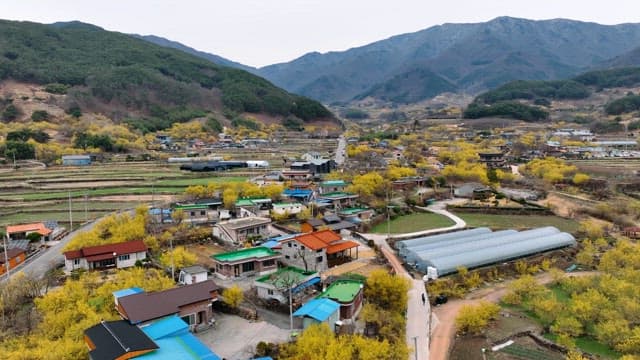 Rural village surrounded by mountains