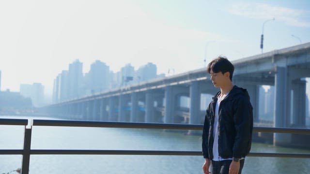 Man checking smartwatch outdoors