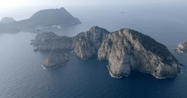 Aerial view of rocky islands and sea