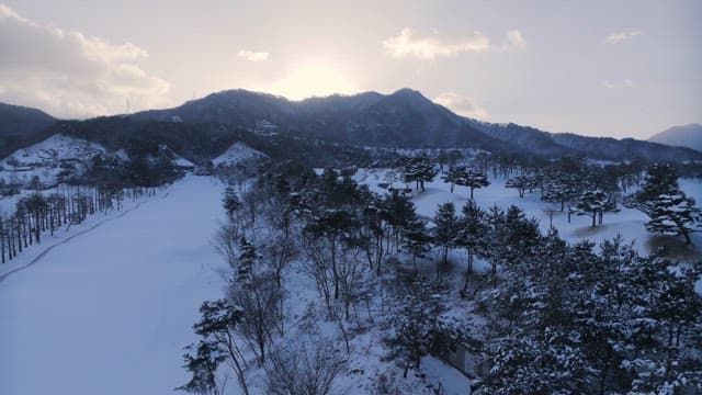 Serene Winter Landscape with Snowy Mountains