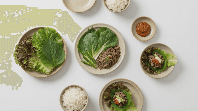 Bulgogi with rice and leafy greens for wrapping