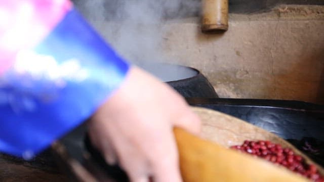 Adding Red Beans to a Boiling Cauldron