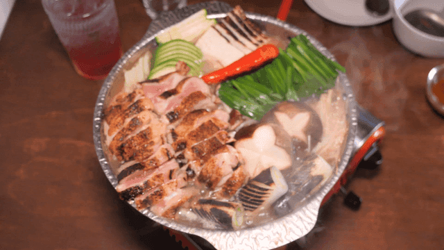 Hot, boiling chicken stew with vegetables