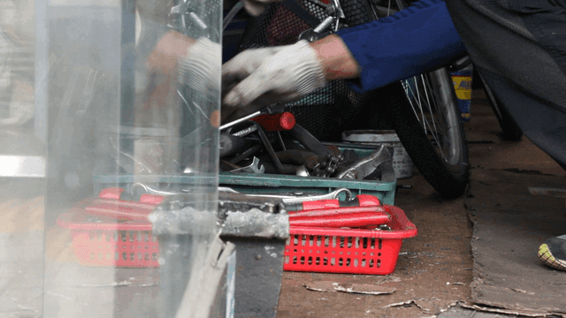 Person working with tools in a workshop