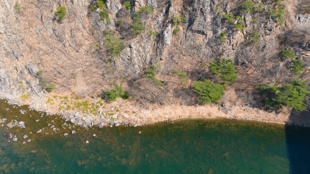 Rocky riverbank with clear water