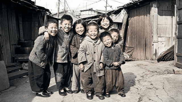Children laughing and hugging in alley in 70s