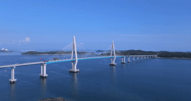 Long bridge placed over calm sea
