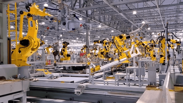 Robotic arms in an automated factory