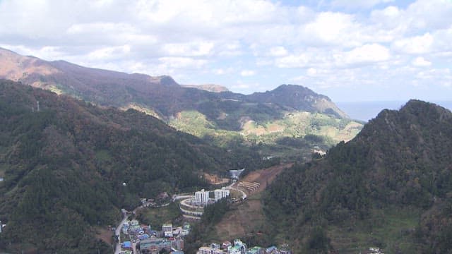 Coastal Town Nestled Between Mountains