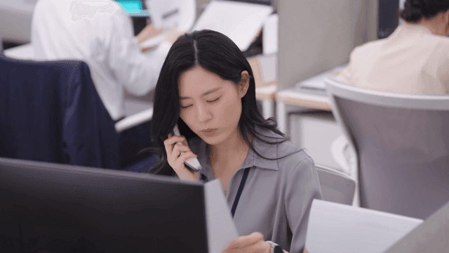 Office worker talking on the phone