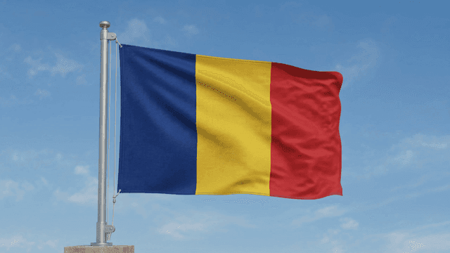 Romanian flag fluttering under clear sky
