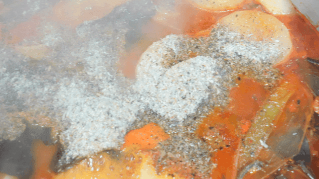 Hot stew with seasonings and vegetables